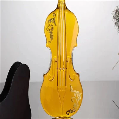 Garrafa de vidro em forma de guitarra